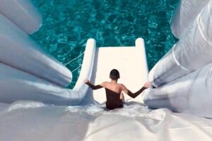 Blue Lagoon cruise: giant slide, music & Paphos hotel transfers - Latchi Harbor to the boat ride: music, safety, and that slide moment