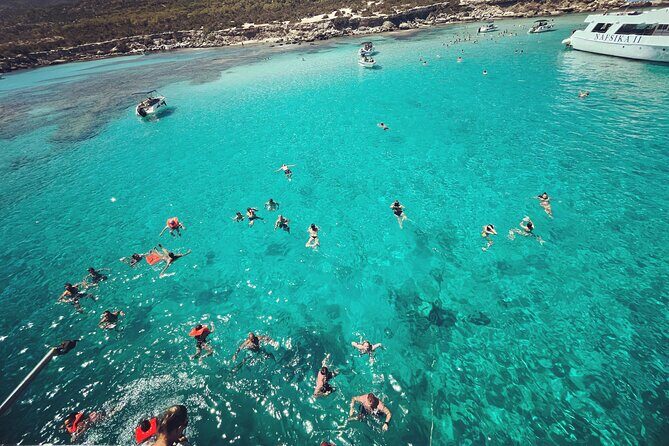 Blue Lagoon trip with slide & music departing from Latchi harbour - Manolis Bay and the cave story you’ll actually remember