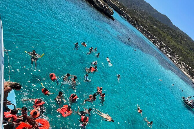 Blue Lagoon trip with slide & music departing from Latchi harbour - The Blue Lagoon swim hour: what it’s like in real time