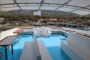 Demetris Chara Boat/Blue Lagoon boat trips with BBQ and SLIDE - The Cruise to Blue Lagoon: Slow Views, Easy Pace