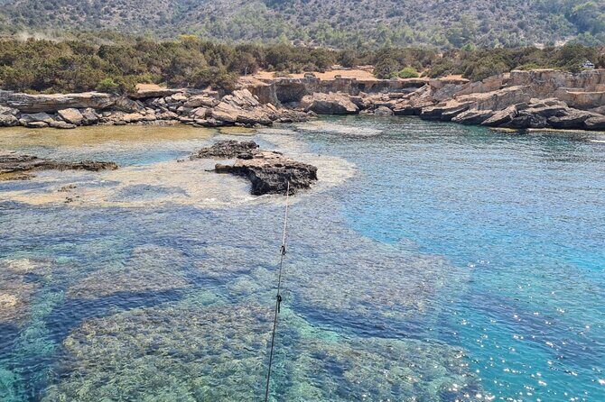 Demetris Chara Boat/Blue Lagoon boat trips with BBQ and SLIDE - Pickup, English Onboard, and Mobile Tickets